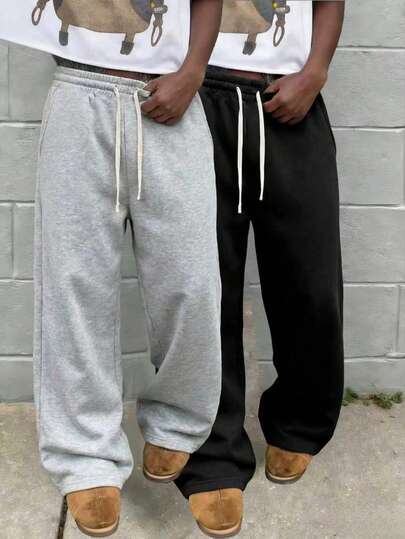 Enfärgade, enkla och mångsidiga stickade byxor för män, lämpliga för sport och fritidskläder, moderiktiga och bekväma. Kvinnor kan ge bort dem som present till sin pojkvän eller make.