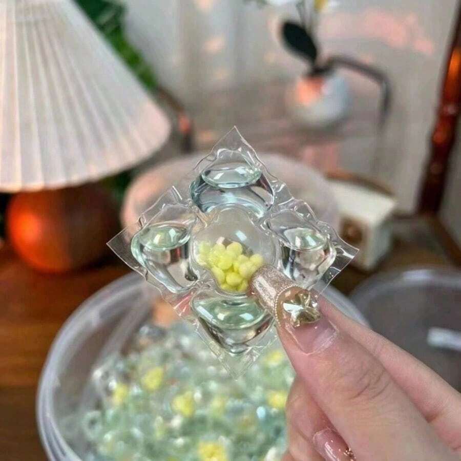 100粒/50粒/30粒装 五合一山茶花洗衣凝珠，浓缩型洗衣球，去污力强，持久留香，有效去除顽固污渍，抗菌除臭，柔顺衣物，适用于所有家用洗衣机