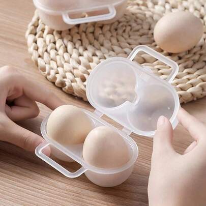 1 hộp đựng trứng di động 2 ngăn bằng polypropylene, màu trơn, chống va đập, thích hợp sử dụng ngoài trời.