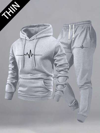 男士两件套运动服，包含一件连帽卫衣和一条抽绳运动裤，适合所有季节穿着。轻盈透气，饰有独特的心电图印花图案。无论您是去健身房、通勤上学、与朋友聚会，还是结束一天的工作后在家放松，这套运动服都能轻松应对各种运动和休闲场合。这套两件套运动服也是送给健身爱好者、学生或任何喜欢舒适时尚休闲服饰人士的贴心礼物。