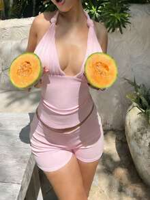 这款女士复古Y2K露脐吊带系带露脐上衣，浅粉色，低胸设计，修身剪裁，搭配超短迷你短裤，是街头、海岛、海滩等休闲度假场景的理想之选，尽显夏日优雅气质。 - 淺粉色 - 查看 7