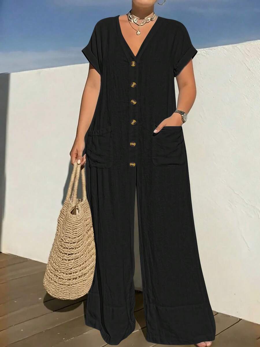 Bộ jumpsuit nữ màu đen cổ chữ V, tay ngắn, ống rộng, dáng rộng thoải mái, có túi, thích hợp mặc hàng ngày khi đi biển mùa hè, kiểu dáng thanh lịch.