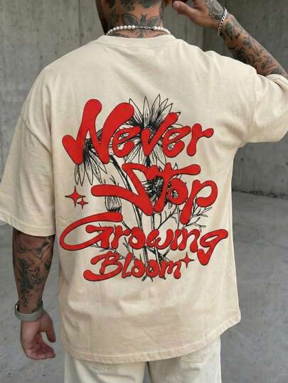 加大码男士宽松休闲街头风T恤，饰有花卉字母标语图案，超大版型，双面柔软植物印花，夏季款