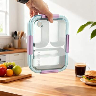 三格便当盒，大容量食物午餐盒。采用PP塑料外壳和304不锈钢内胆，具有保温功能。可拆卸设计，配有餐具。经久耐用，防漏便携，适合通勤、旅行和外出就餐。