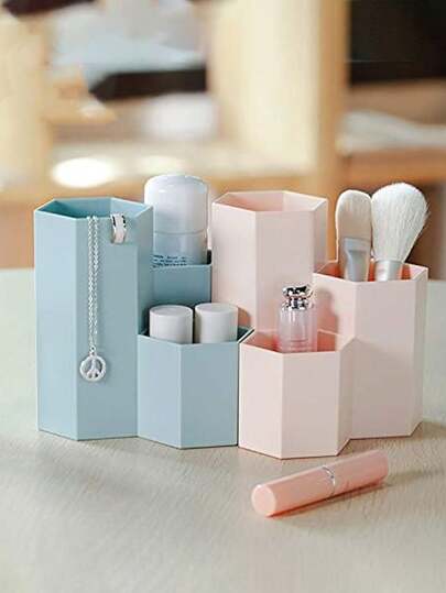 1个创意多功能六边形桌面笔筒，适用于收纳化妆刷、画笔、钢笔、文具等。可用于桌面化妆品收纳、化妆刷收纳、梳妆台收纳、眉笔和眼线笔收纳。颜色随机发货，现有粉色和杏色可选。