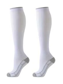 男女通用压缩袜，1/2/4 双装，采用尼龙涤纶混纺针织面料，贴合腿部曲线，为瑜伽、马拉松、滑雪、网球、足球、健身、篮球等运动提供支撑，可机洗。 - 彩色 - 查看 10