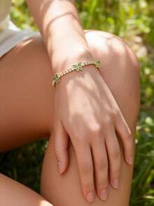 1条18K镀金网球锆石链，蝴蝶造型，适合女孩作为友谊手链或休闲服饰佩戴 - 理想的礼物 - 蝴蝶型 - 查看 2