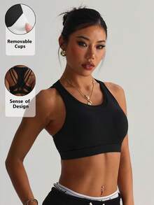 Soutien-gorge de sport en tricot à col rond amovible et rembourré, avec patchwork en maille et dos croisé, couleur unie pour femmes - Noir - Voir 1