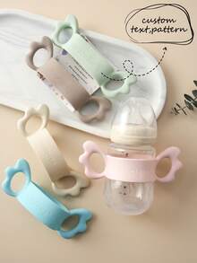 1pc Personalized Customization Debossed Name And Pattern Wings Silicone Baby Bottle Cover Lightweight Baby Bottle Handle Grip Sleeve With Partial Protection, Anti-Slip Design For Bottles And Water Cups Childern Essentials Gifts - Intaglio Multicolor Printing - View 1