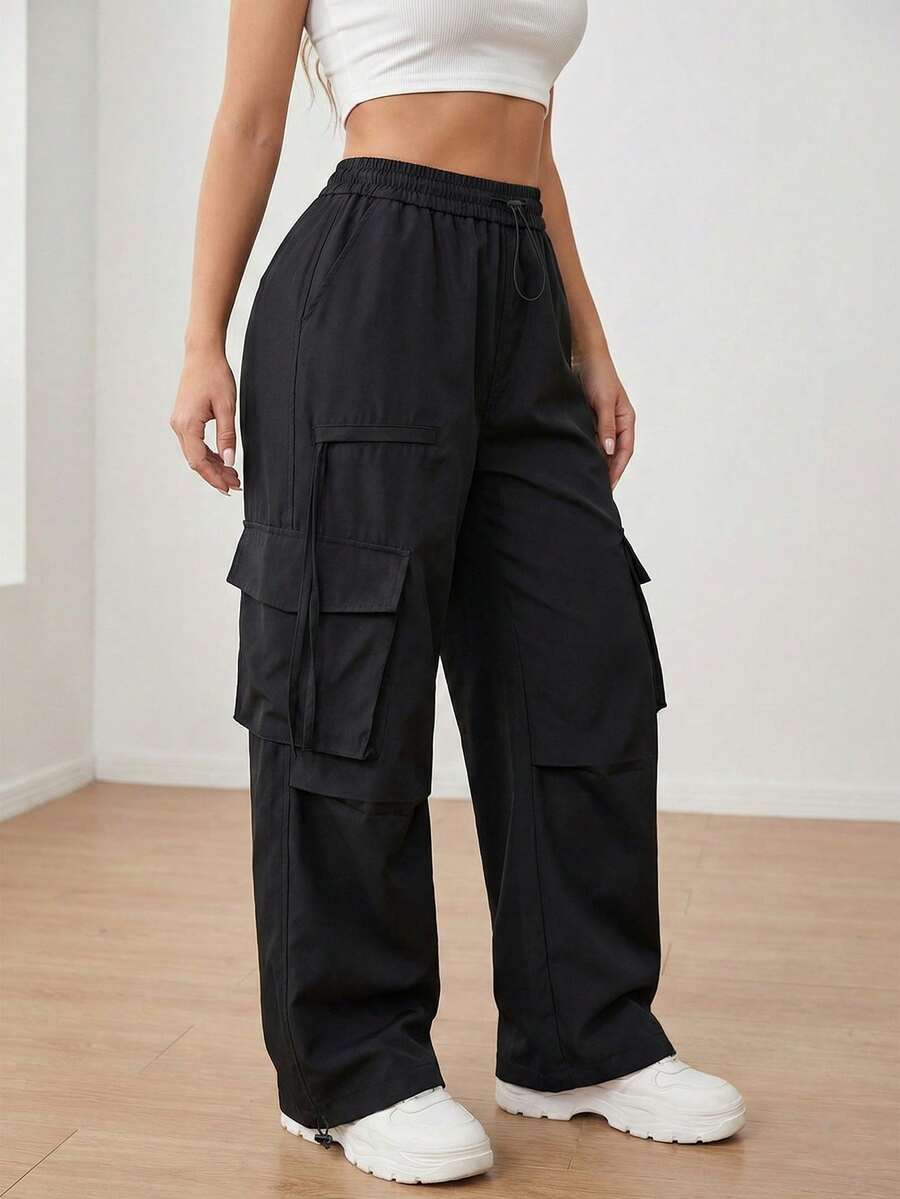 Pantalones cargo holgados de tiro alto para mujer, con múltiples bolsillos y dobladillo con cordón para uso urbano y casual en color negro - Negro - Ver 1