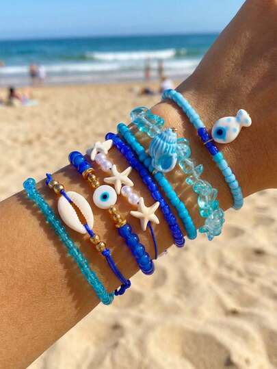 Set de 8 piezas de pulseras con cuentas azules con diseños de peces, conchas, estrellas de mar y caracolas, adecuado para uso diario y playa, regalo