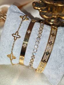 1/4件套奢华不锈钢四叶草和六芒星扣手链，搭配优雅立方氧化锆四叶草铜手链和合金圆钻手链，适合女士日常佩戴，亦可作为节日礼物。 - 金色 - 查看 6