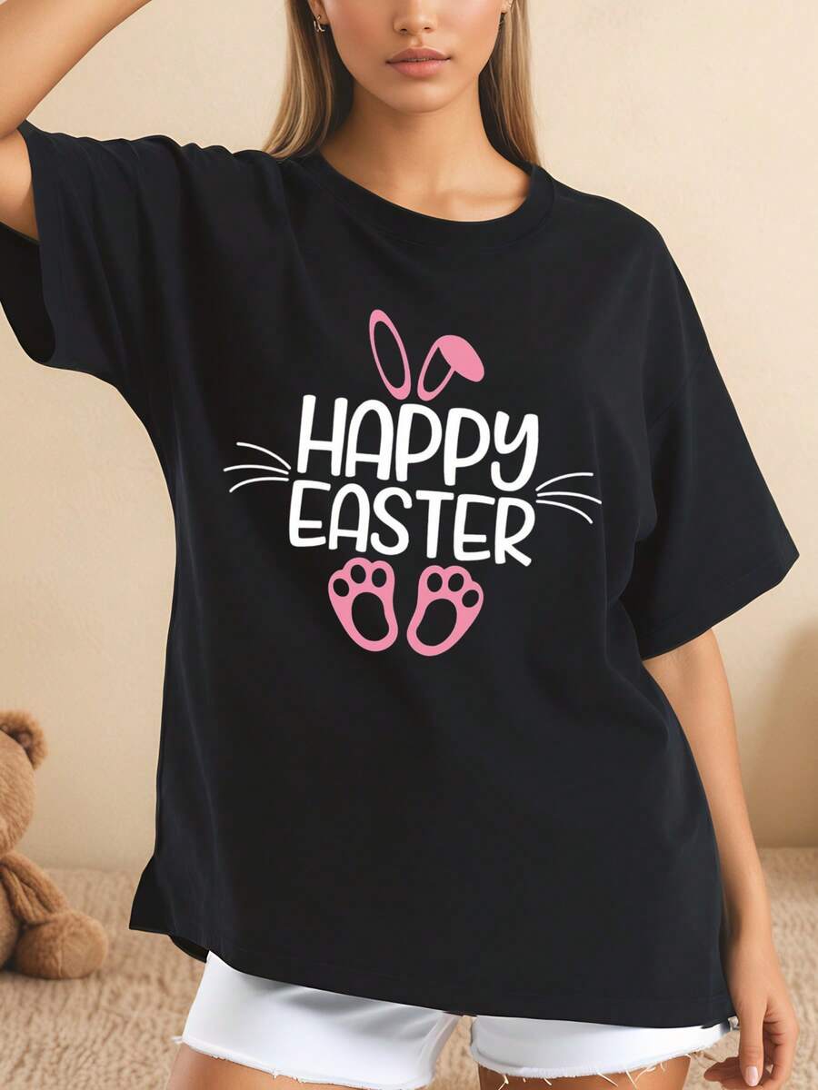 Diseño de conejo con orejas y patas rosadas Happy Easter camiseta negra estilo holgado con estampado divertido para mujeres ocasión casual festiva 220g - Negro - Ver 1