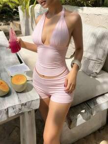 这款女士复古Y2K露脐吊带系带露脐上衣，浅粉色，低胸设计，修身剪裁，搭配超短迷你短裤，是街头、海岛、海滩等休闲度假场景的理想之选，尽显夏日优雅气质。 - 淺粉色 - 查看 8
