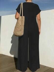 Combinaison élégante et décontractée pour femme grande taille, couleur unie noire, col V, boutonnage simple devant, poches et nœud devant, pour l'été - Noir - Voir 3