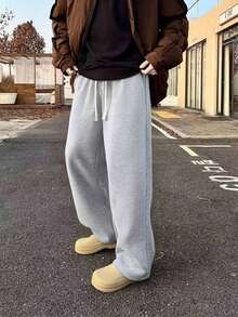 This Men's Casual Sweatpants Feature A Loose, Straight-Leg With A Fleece Comfort And Drape.Suitable Both Indoor And Outdoor Wear, It Also Makes A Great Couples.Pants Are Made Of% Polyester Fabric And Have A Drawstring Waistband Adjustable Fit, Available In Multiple Colors. - Black - View 8