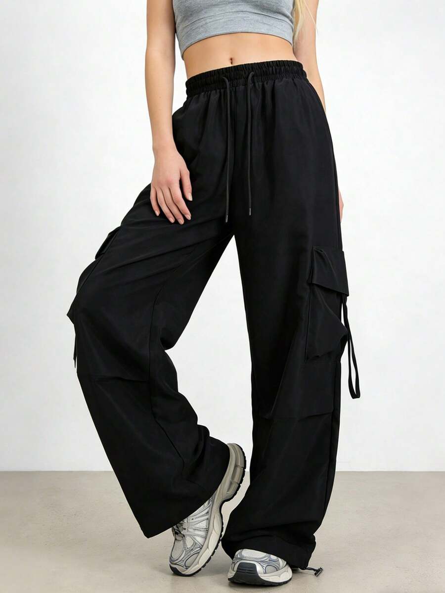 女士科技风长裤，高腰宽松工装裤，多口袋设计，饰有绑带和抽绳裤脚，适合街头风格穿着。 - 黑色 - 查看 1