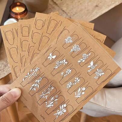 6-Piece Set Of Nail Painting Practice Cards, Double-Sided, Transparent Plastic, Beginner Hand-Drawing Tools, Hand-Drawing Practice Card Nail Art Tools, Vintage Flower Nail Art Transfer Cards, Kraft Paper Base With White Plant Pattern Nail Design Template With Cutting Lines, Self-Adhesive Waterproof Nail Stickers, Convenient For Multiple Nail Painting Combinations