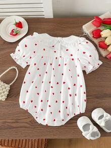 Bộ áo liền quần cho bé gái dễ thương, tay bồng, cổ áo có nơ và họa tiết trái tim, cài khuy ở đáy quần, trang phục thường ngày thời trang và đa năng, phù hợp cho các hoạt động hàng ngày, dự tiệc, đi chơi, mùa xuân/hè. - trắng - Xem 2