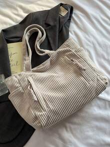 Mẫu túi xách nữ thời thượng mới năm 2026, túi đeo vai công sở dung tích lớn, thiết kế độc đáo, giản dị và đa năng, thời trang tối giản, chất liệu nhung kẻ, dây đeo vai dài, khóa kéo, rộng rãi, túi tote, túi xách nữ phong cách văn học giản dị. - trắng - Xem 7