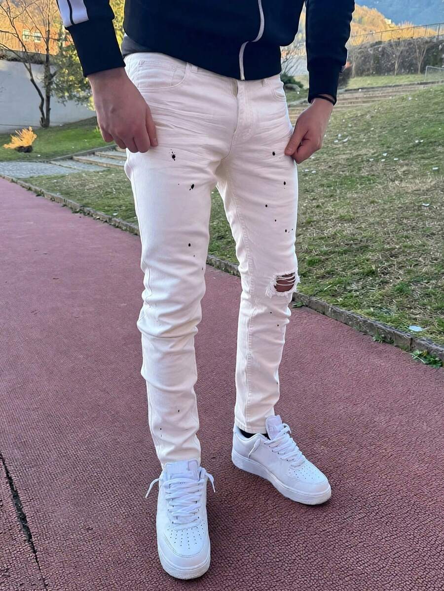 High Street Artistic White Denim Jeans, Men's Slim Fit Distressed Design, Asymmetrical Splatter Paint Accent, Minimalist High Street Y2K , Unique Streetwear Fashion Item - White - View 1