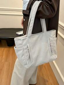 Mẫu túi xách nữ thời thượng mới năm 2026, túi đeo vai công sở dung tích lớn, thiết kế độc đáo, giản dị và đa năng, thời trang tối giản, chất liệu nhung kẻ, dây đeo vai dài, khóa kéo, rộng rãi, túi tote, túi xách nữ phong cách văn học giản dị. - trắng - Xem 4