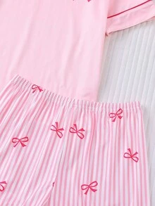 Bộ đồ ngủ ngắn tay in họa tiết sọc và nơ cho trẻ em, gồm áo ngắn tay và quần short cạp chun rộng có bèo nhún, thích hợp cho trẻ em và thanh thiếu niên mặc thường ngày, đi nghỉ mát, dự tiệc. - Hồng - Xem 6