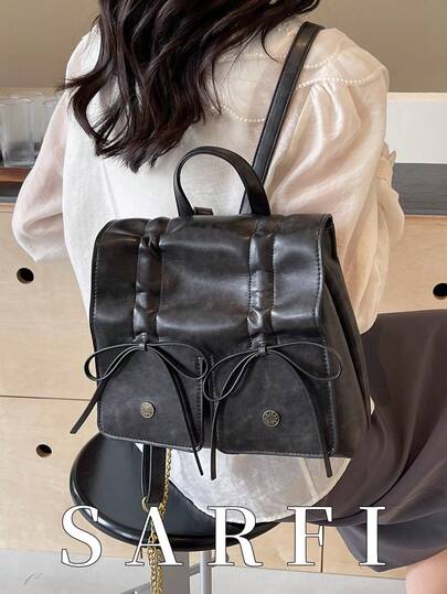 秋冬新款时尚学院风女式双肩包；高端简约可爱蝴蝶装饰双肩包