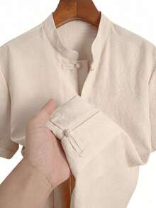 Camisa con cuello alzado con botón para hombres de moda, camisa informal de negocio de unicolor y estilo minimalista, adecuada para el estilo nacional elegante y sencillo, nueva camisa de manga corta para verano - Albaricoque - Ver 6