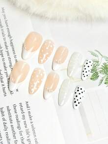 10片中号杏仁形假指甲，裸粉色半透明底色，法式白色边缘，珍珠点缀，波点和3D纹理设计，清新柔美风格，100%纯手工制作，按压式亚克力指甲，可重复使用。美甲用品套装包含1片果冻胶、1根胶棒和1把指甲锉，适合女性日常或派对佩戴。 - 彩色 - 查看 13