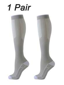 男女通用压缩袜，1/2/4 双装，采用尼龙涤纶混纺针织面料，贴合腿部曲线，为瑜伽、马拉松、滑雪、网球、足球、健身、篮球等运动提供支撑，可机洗。 - 彩色 - 查看 18