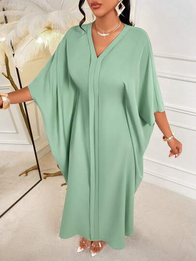 Amarilo 女士春夏优雅V领连衣裙，荷叶袖宽松蝙蝠袖下摆，适合各种节日穿着