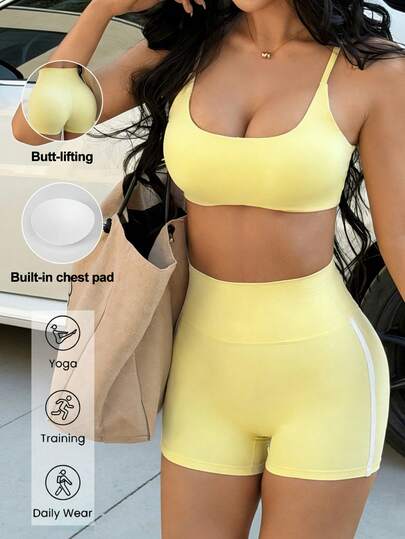 Bộ đồ thể thao hai mảnh dành cho nữ của Aoqta Sports, màu trơn, gồm áo ngực không tay kiểu yếm và quần short cạp cao ôm sát, thích hợp cho mùa hè tập thể dục và yoga.