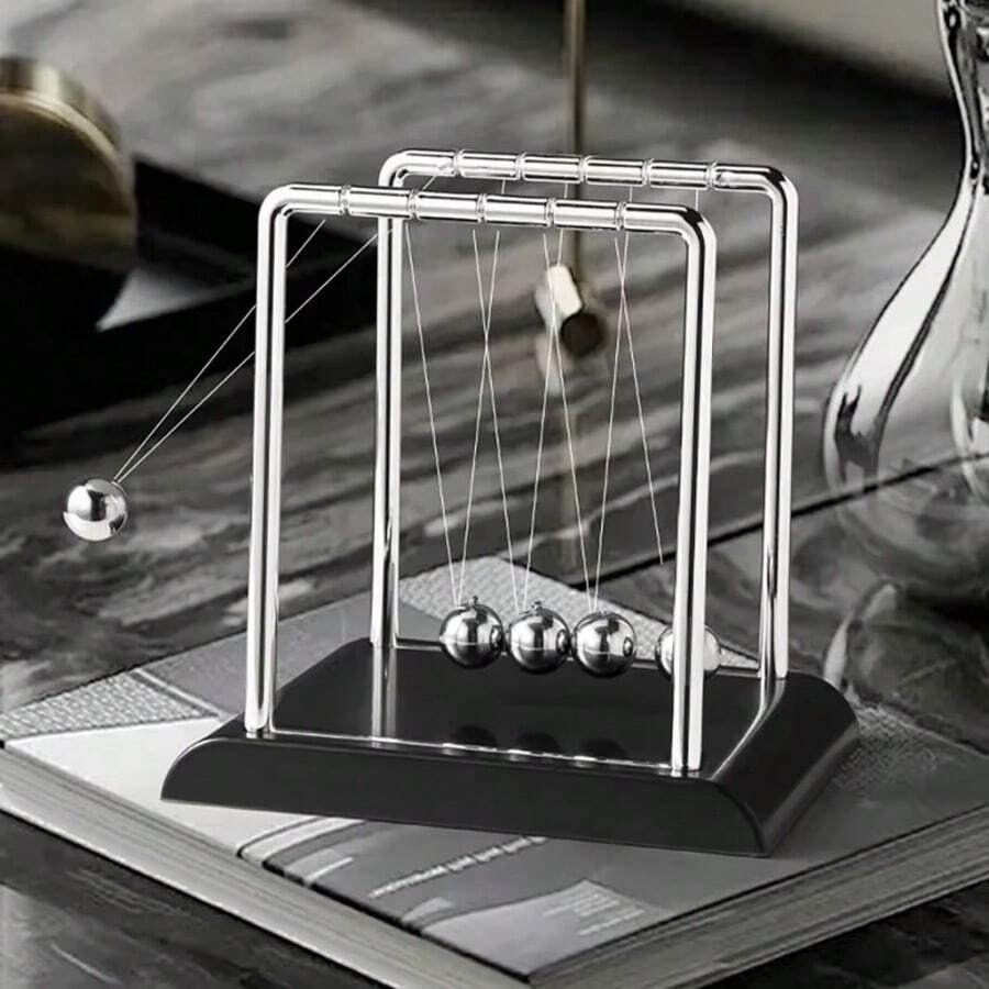 1pc Mini Newton's Cradle, Designed In Modern Minimalist Style, Made Of Metal; The Spheres Can Swing, Providing Dynamic Visual Effect. This Physics Teaching Decor Piece Is Suitable For Office Decoration, As Well As A Gift Or Housewarming Present.