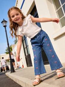 1 chiếc quần jeans ống loe màu xanh dương dễ thương thêu nơ hồng cho bé gái, kiểu dáng thường ngày, đa năng. - Rửa trung bình - Xem 3