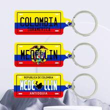 1个哥伦比亚城市名称元素双面UV印刷钥匙扣,男女通用时尚配饰包包挂饰钥匙圈 - 彩色 - 查看 10