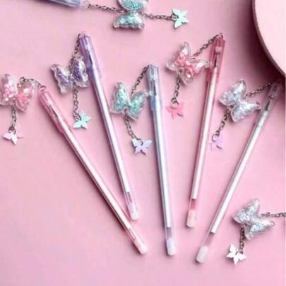 闪亮蝴蝶吊坠中性笔，可爱又实用，适合办公和学习，是返校、学习用品、感恩节、万圣节、圣诞节和沙特国庆节的理想礼物。