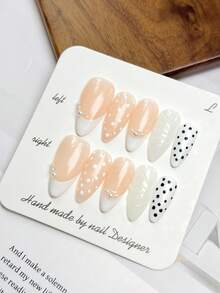 10片中号杏仁形假指甲，裸粉色半透明底色，法式白色边缘，珍珠点缀，波点和3D纹理设计，清新柔美风格，100%纯手工制作，按压式亚克力指甲，可重复使用。美甲用品套装包含1片果冻胶、1根胶棒和1把指甲锉，适合女性日常或派对佩戴。 - 彩色 - 查看 4