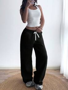 Quần thể thao nữ kiểu Hàn Quốc đơn giản, màu trơn, có dây rút và túi. - màu đen - Xem 2