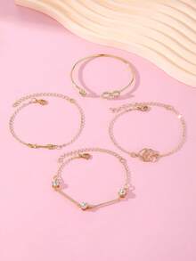 Set de 4 piezas de pulsera y brazalete de lujo con diseños de símbolo del infinito, flecha, pluma, strass y corazón, de diseño elegante, minimalista y de alta gama - Amarillo Oro - Ver 5