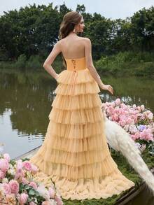 Faeriesty Đầm dạ hội cúp ngực thanh lịch với phần thân áo xếp ly, chân váy xếp tầng bằng vải tuyn mềm mại, thiết kế tinh tế, thích hợp cho các buổi tiệc tối trang trọng, trang phục dự đám cưới, chụp ảnh cưới, sự kiện thảm đỏ, các buổi dạ tiệc sang trọng và tiệc mùa xuân. - Màu Cam san hô - Xem 2