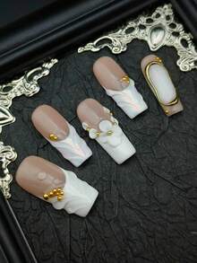 10片闪亮金色长方形亮片假指甲套装，包含红色亮片指甲、3D手工银色蝴蝶结、银色波浪形和圆形法式美甲，适合情人节、新年派对佩戴，女士适用，附赠指甲胶贴和指甲锉。手工制作的按压式美甲。 - 白色 - 查看 7