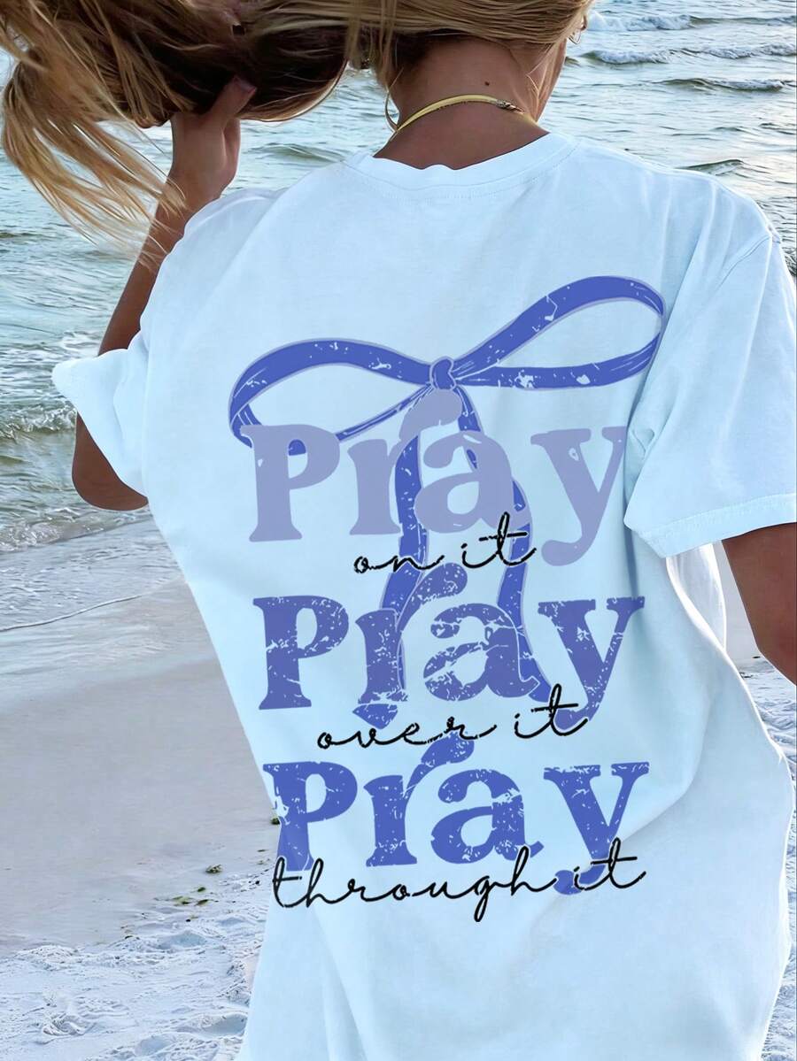 Áo thun oversized in hình "Pray" dành cho bé gái - In hình phía sau với điểm nhấn nơ và khẩu hiệu truyền cảm hứng - Áo thun thường ngày thoải mái cho mùa tựu trường và tụ tập bạn bè. - Màu xanh nhạt - Xem 1