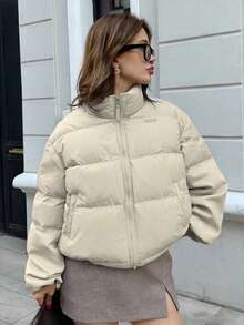 Inspirado en el estilo europeo y americano, este abrigo de mujer francés presenta un cuello alto, está hecho de algodón cálido y tiene un cierre con cremallera. - Albaricoque - Ver 1