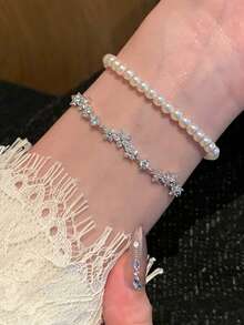 1件时尚精致闪亮立方氧化锆五瓣花手链，优雅可调节立方氧化锆手链，适合女性佩戴，可用于派对、日常佩戴和婚礼等场合。 - 花朵手鍊 - 查看 11