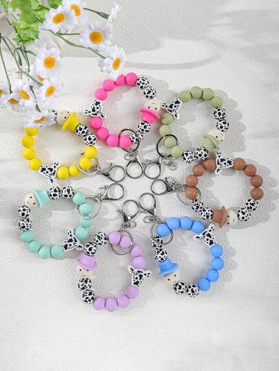 1pc Niche Cow Print Contrast Color Silicone Wristband Keychain, Cute Cartoon Head Pendant, Bag & Car Key Chain