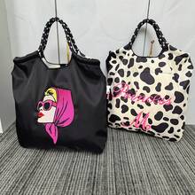 大容量可折叠尼龙手提包，饰有人头刺绣，单肩手提包 - 彩色 - 查看 1