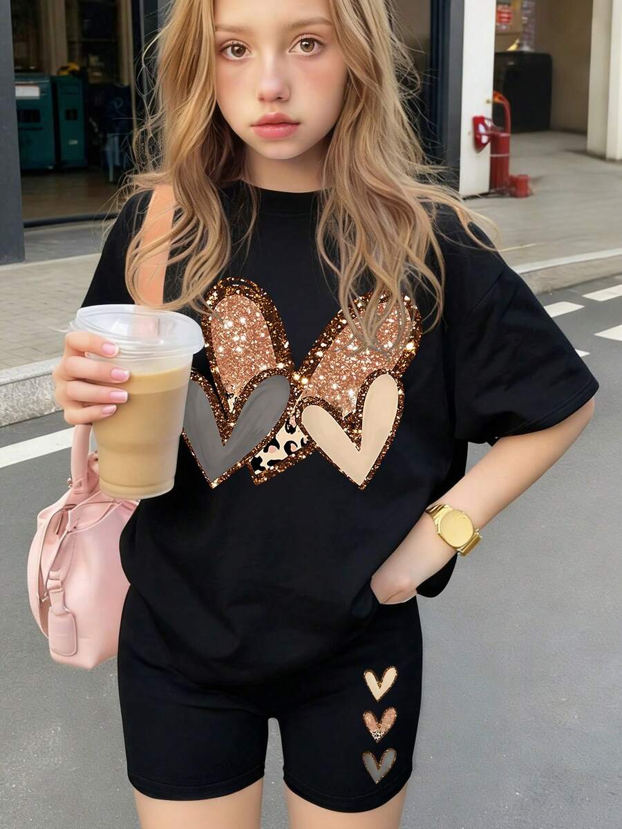 2 piezas Conjunto de niña de manga corta y ajuste holgado, con estampado de leopardo y decoración de corazón, shorts elásticos, conjunto de primavera/verano de moda y divertido - Negro - Ver 1