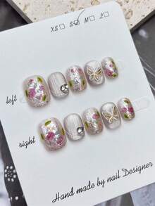 10 Stücke handgefertigte ovale Kunstnägel pro Set, mit silbernem Stern-Katzenaugen-Design und dekoriert mit silbernen Stern-Pailletten, inklusive Werkzeug. Es kann als Geschenkset für Frauen zu Feiertagen gegeben werden und ist für den täglichen Gebrauch durch Frauen jeden Stils geeignet. - Verschiedenfarbig - Übersicht 4