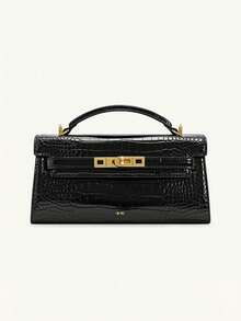 Chiếc túi xách sang trọng, tối giản mới này kết hợp giữa chất liệu da và chất liệu dệt, làm nổi bật chất lượng tổng thể. Khóa kim loại lấy cảm hứng từ phong cách cổ điển kết hợp với quai xách ngắn, mang đến cả vẻ thanh lịch và tính tiện dụng. - Nhiều màu - Xem 11